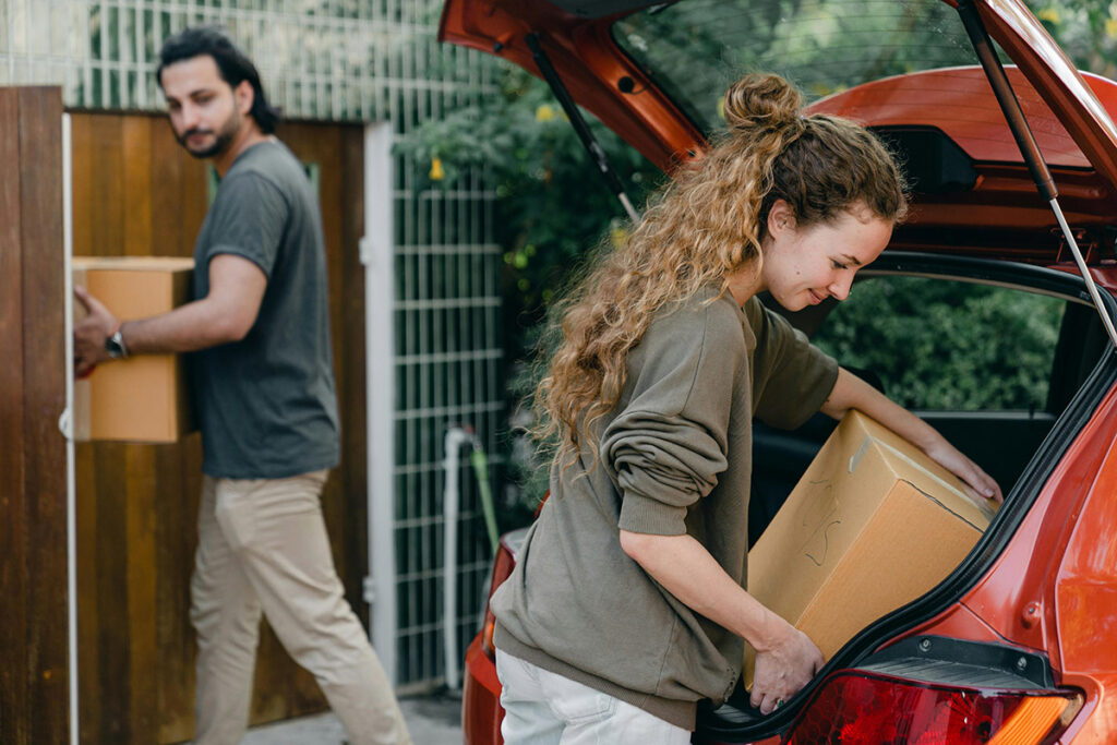 Couple packing for a move