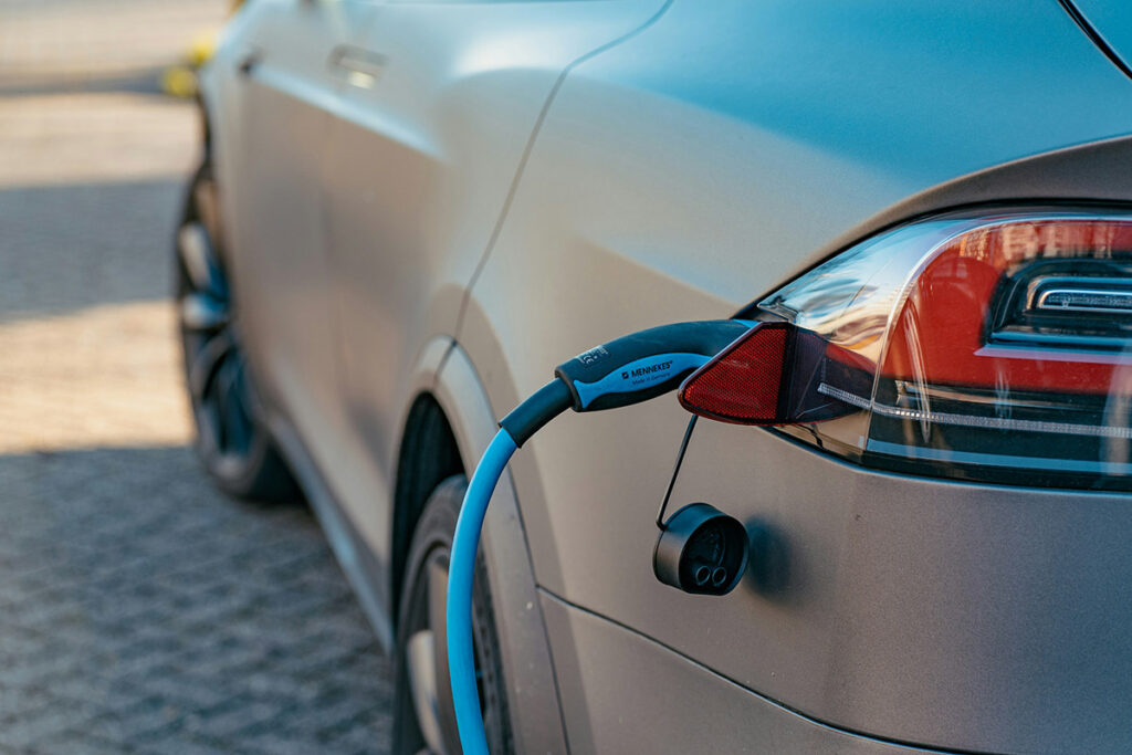 Electric car being charged